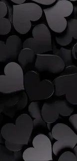 Elegant black hearts pattern wallpaper on a mobile phone background.