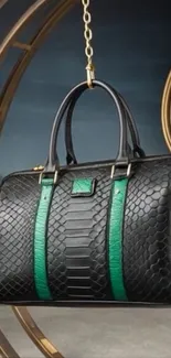 Elegant black leather handbag with green accents on display.