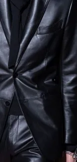 Elegant black leather suit with sleek style.