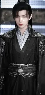 Serene figure in detailed black robe with traditional design.