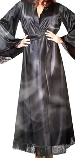 Elegant black satin robe with flared sleeves and lace trim.