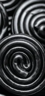 Elegant black spiral design with glossy texture.