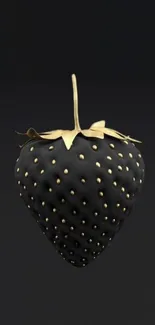 Elegant black strawberry with gold accents on a dark background.