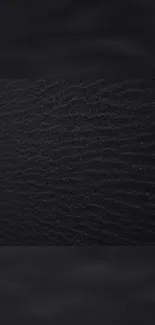 Elegant black texture wallpaper for sleek mobile phone display.