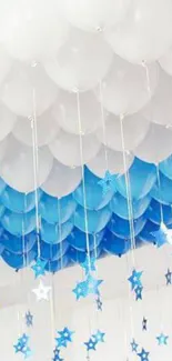 Blue and white balloons with star decorations.