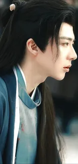 Anime character in elegant blue attire, side profile view.