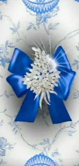 Elegant blue bow with floral and crystal design wallpaper.