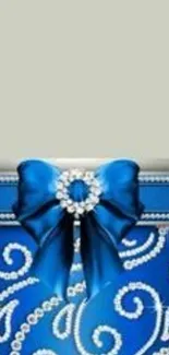 Mobile wallpaper with an elegant blue bow and intricate decorative pattern.