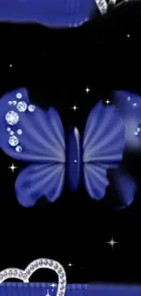 Blue butterfly with jewel accents on black background.