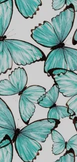 Elegant teal blue butterfly wallpaper design.