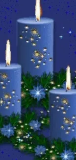 Elegant blue candles with greenery on dark background.