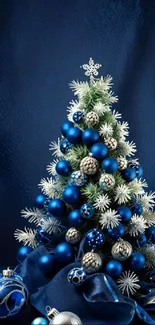 Blue Christmas tree with ornaments wallpaper.