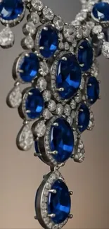Elegant blue gemstone and diamond necklace wallpaper.
