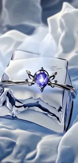 Blue gemstone ring on icy background.