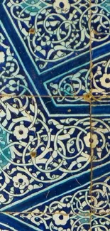 Intricate blue mosaic tile pattern with floral elements.