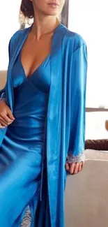 Elegant blue satin dress in stylish setting.