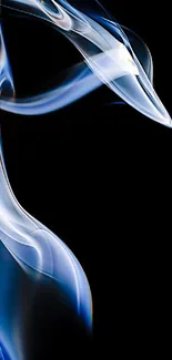 Blue ethereal smoke on a black background, creating an elegant and abstract visual.