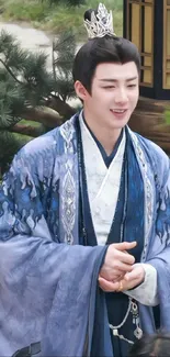 Man in traditional attire with blue robe