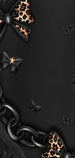 Elegant black wallpaper with bows and chains.