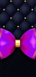 Purple bow on dark quilted background wallpaper.