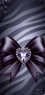 Mobile wallpaper with bow and heart on zebra pattern.