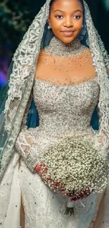 Elegant bride in shimmering lace gown holding a bouquet.