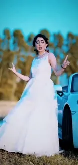 Elegant bride in white gown beside luxury car on a sunny day.