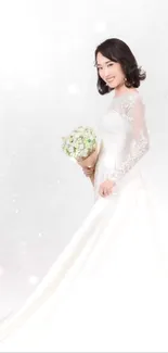 Elegant bride in white gown with delicate bouquet.