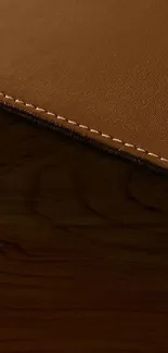 Brown leather texture with detailed stitching design.