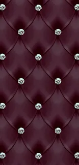 Burgundy tufted wallpaper with diamond accents.