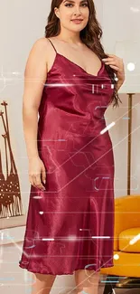 Elegant woman in burgundy silk dress in modern room.