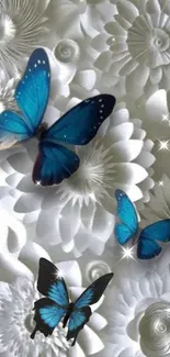 Blue butterflies on textured floral wallpaper.