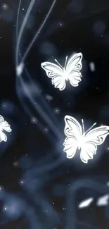 Glowing white butterflies on a dark, abstract background wallpaper.