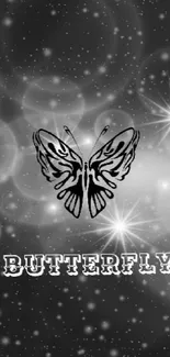 Butterfly and stars on monochrome wallpaper