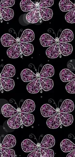 Purple swirling butterfly pattern on black wallpaper.