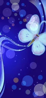 Glowing butterfly on a blue background wallpaper.