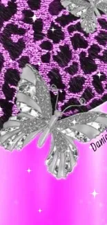 Silver butterflies on a purple leopard print wallpaper.