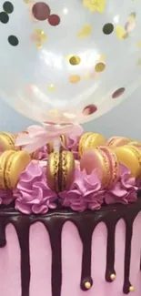 Purple cake with macarons and balloon decoration.