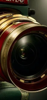 Close-up of a luxurious golden camera lens with red accents, perfect for mobile wallpaper.