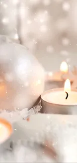 Elegant holiday wallpaper with candles and ornaments in a snowy setting.