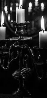 Black and white candlelight wallpaper with elegant ambiance.