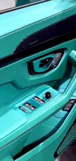 Teal luxury car door and handle design wallpaper.