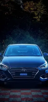 Front view of an elegant dark blue car in high-resolution wallpaper.