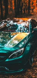 Green sports car in an autumn forest setting with vibrant leaves.