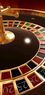 Luxurious gold roulette wheel on red background.