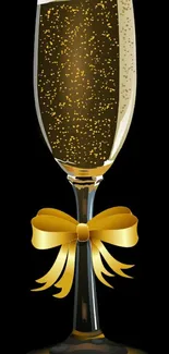 Champagne glass with bubbles and golden bow, set on a black background.