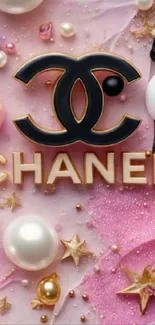 Chanel-themed wallpaper with pearls and gold accents on pink background.
