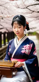 Traditional Japanese woman in kimono with cherry blossoms.