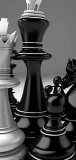 Monochrome chess pieces forming an elegant arrangement.