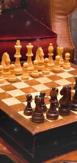 Rustic chess set on a wooden board with elegant pieces.